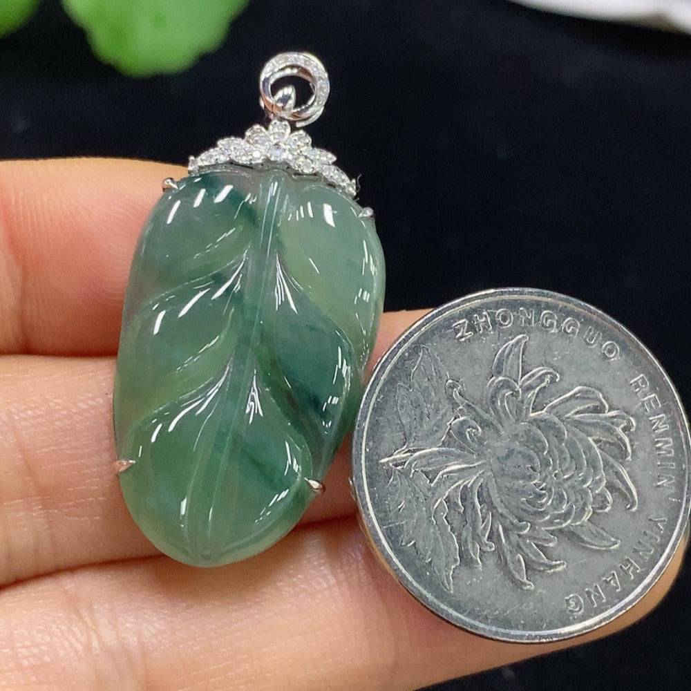 Jadeite leaf pendant by HUILIU HQ with 18k gold and diamond accents, featuring intricate leaf design and polished finish.