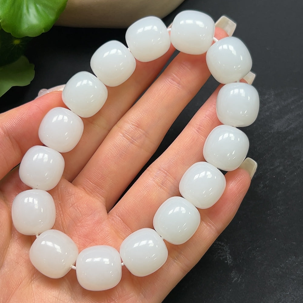 HKHQ Hetian Jade bracelet featuring smooth, polished green jade beads, weighing 87.51g, showcases elegant craftsmanship.