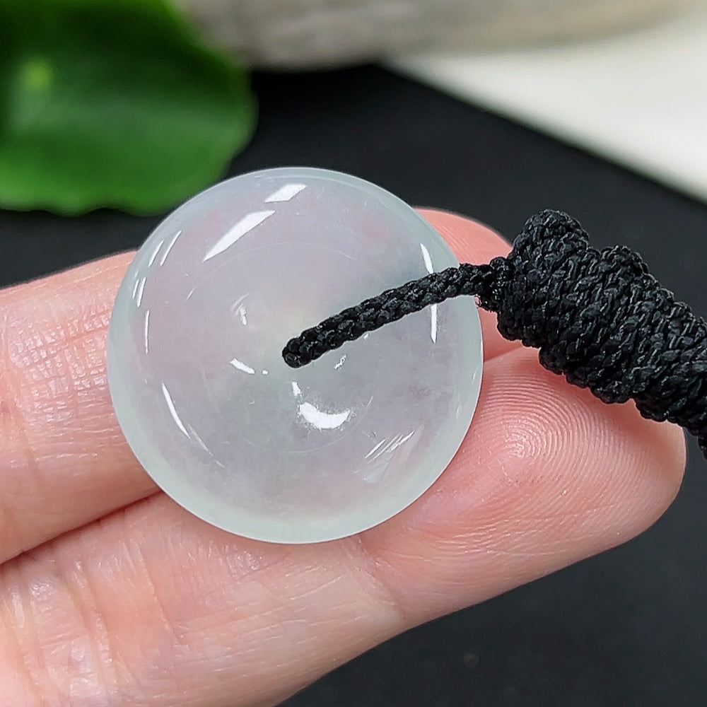 Jadeite Peace Knot pendant with a polished jade jade, weighs about 7.1g including the rope, featuring a smooth, carved design.