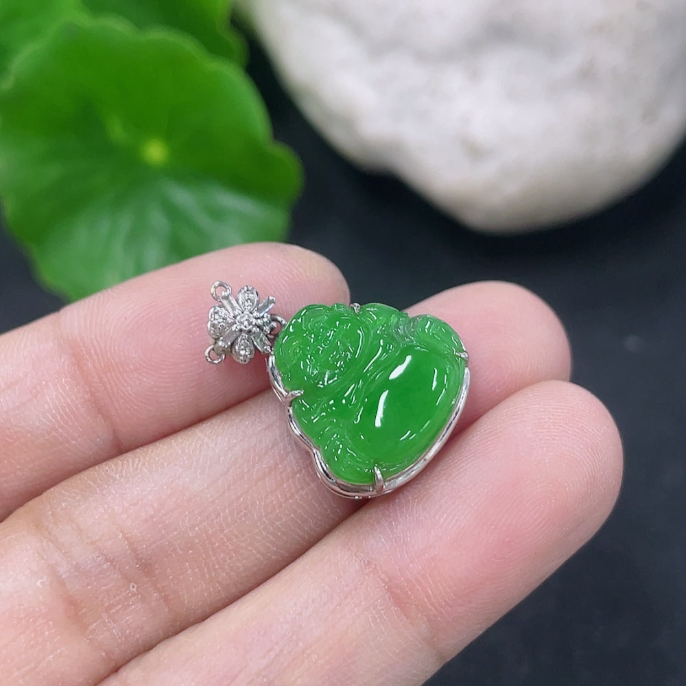 Jadeite Buddha pendant necklace with 18K gold and diamond accents, featuring a detailed Buddha design on a sleek chain.