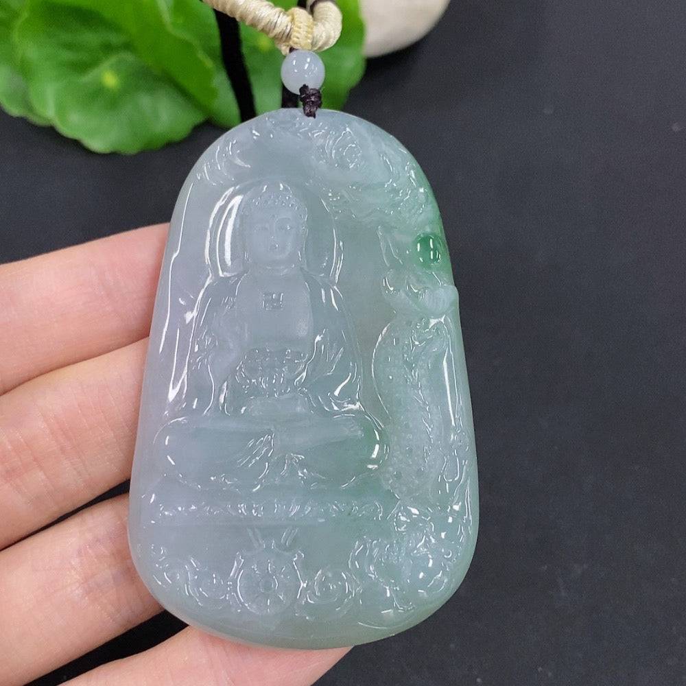 Jadeite Amitabha pendant crafted from green jade, featuring a carved Buddhist figure, displayed on a chain.