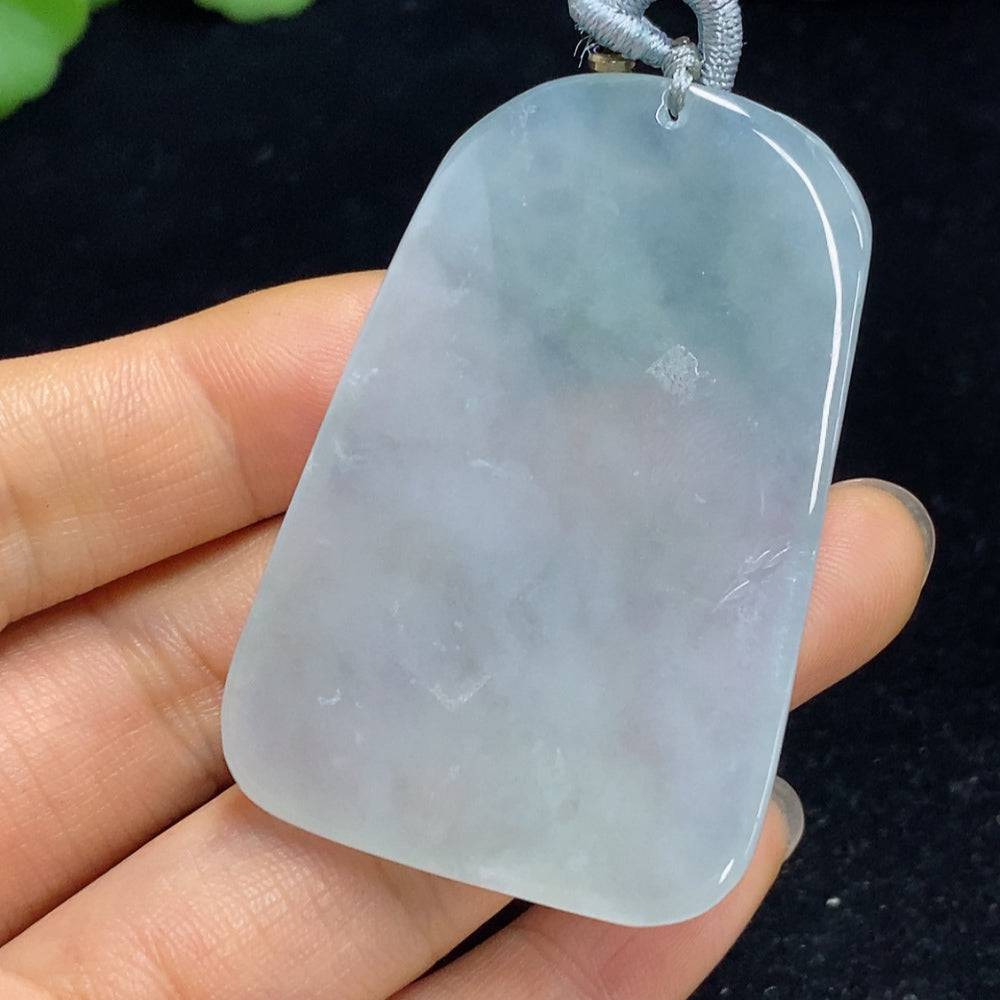Jadeite landscape pendant from HUILIU HQ featuring intricate carved scene, weighs approximately 37.09g including rope.