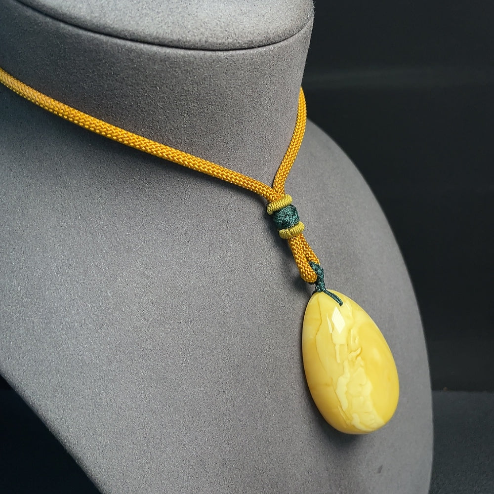 Amber Beeswax Pendant . Including Rope | Huiliu Certified