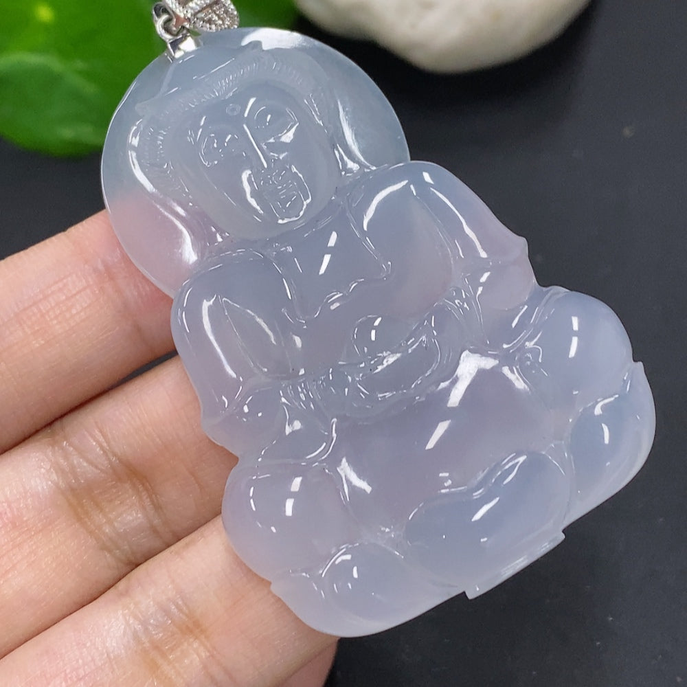 Jadeite Guanyin pendant with 18K gold clasp and diamond accents, displayed on a necklace chain.
