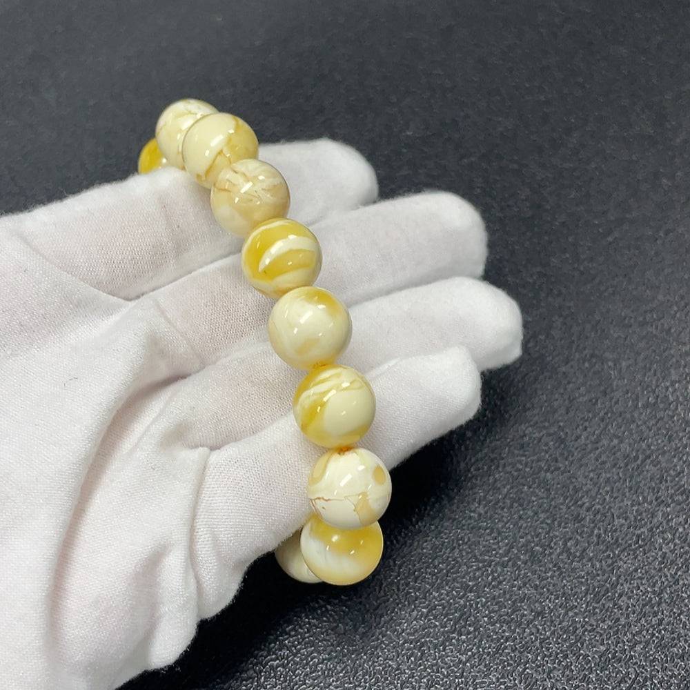 Huiliu Amber Beeswax Bracelet with 12.3mm beads, natural amber color, certified quality, handcrafted jewelry accessory