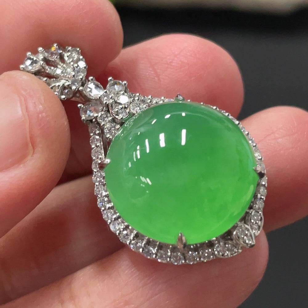 HUILIU HQ jadeite cabochon pendant with 18K gold setting and diamond accents, showcasing a polished green jade stone.