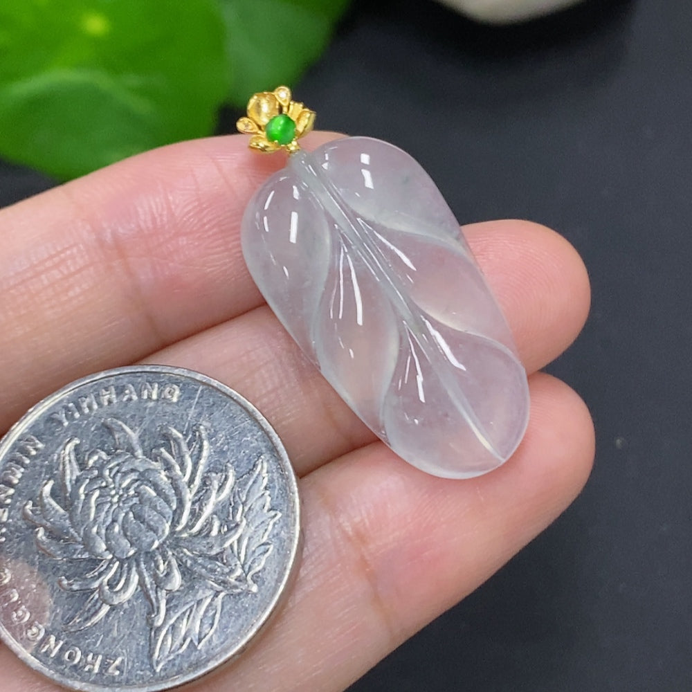 Jadeite leaf pendant with 18K gold clasp, featuring detailed leaf design, weighing approximately 3.9g, by HKHQ.