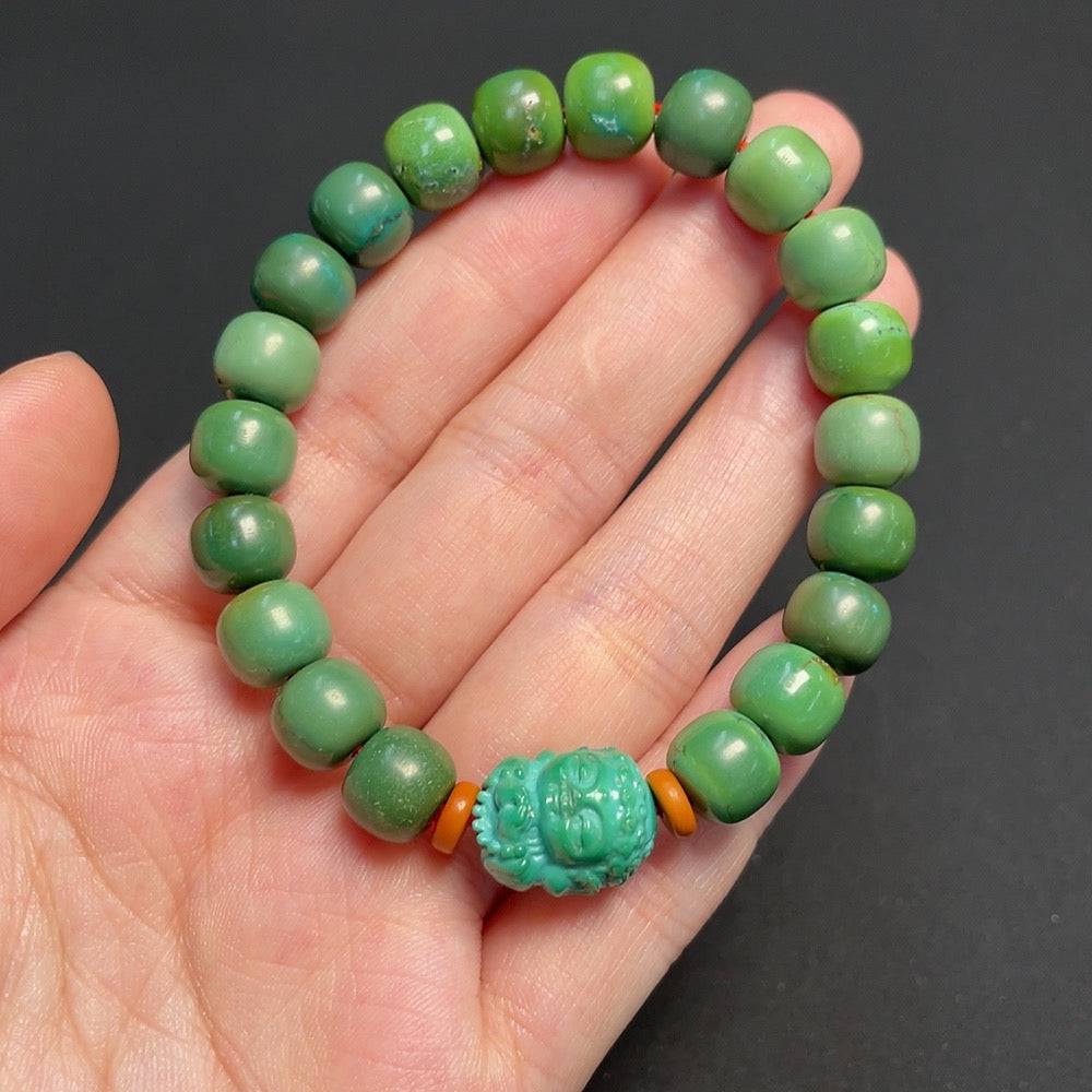 Turquoise gemstone bracelet with 8.9mm beads from HUILIU HQ, showcasing vibrant blue beads and silver clasp detail.