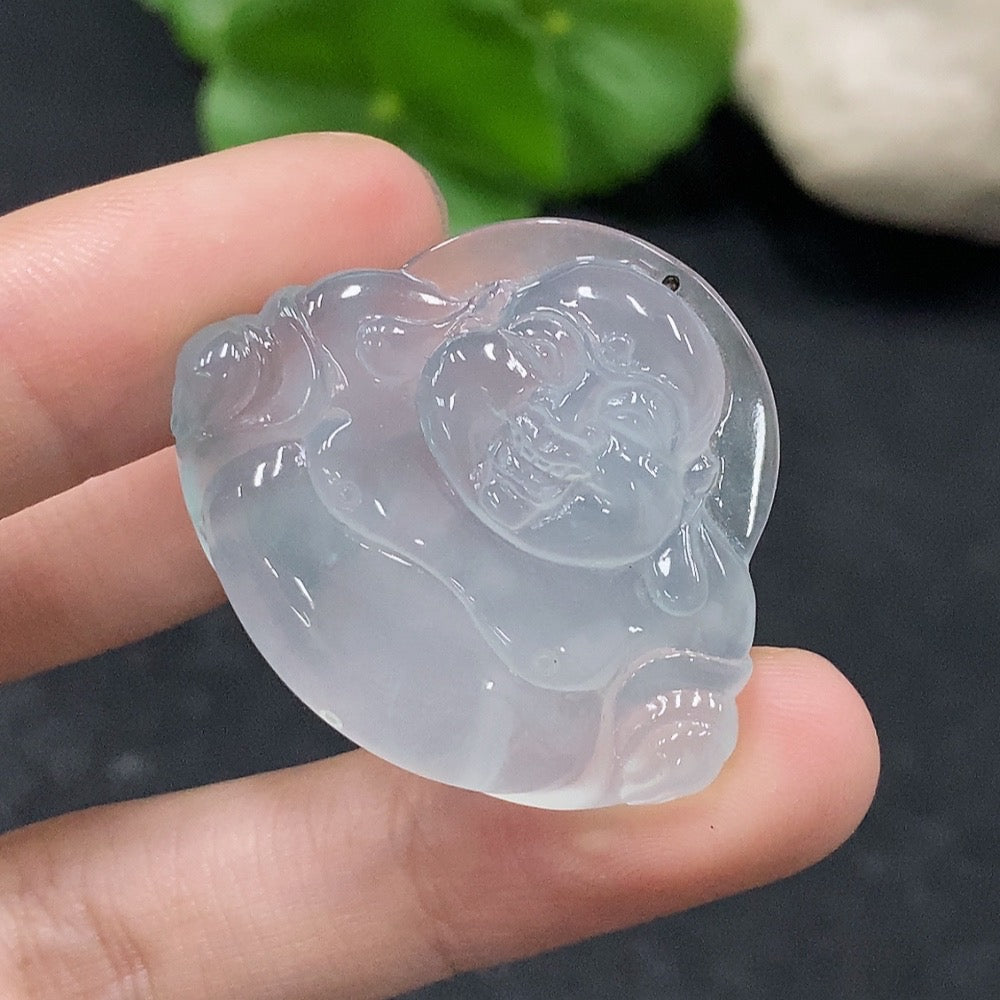 Jadeite Buddha pendant from HUILIU HQ, carved from green jade, weighing approximately 12.14 grams, with detailed Buddha figure.