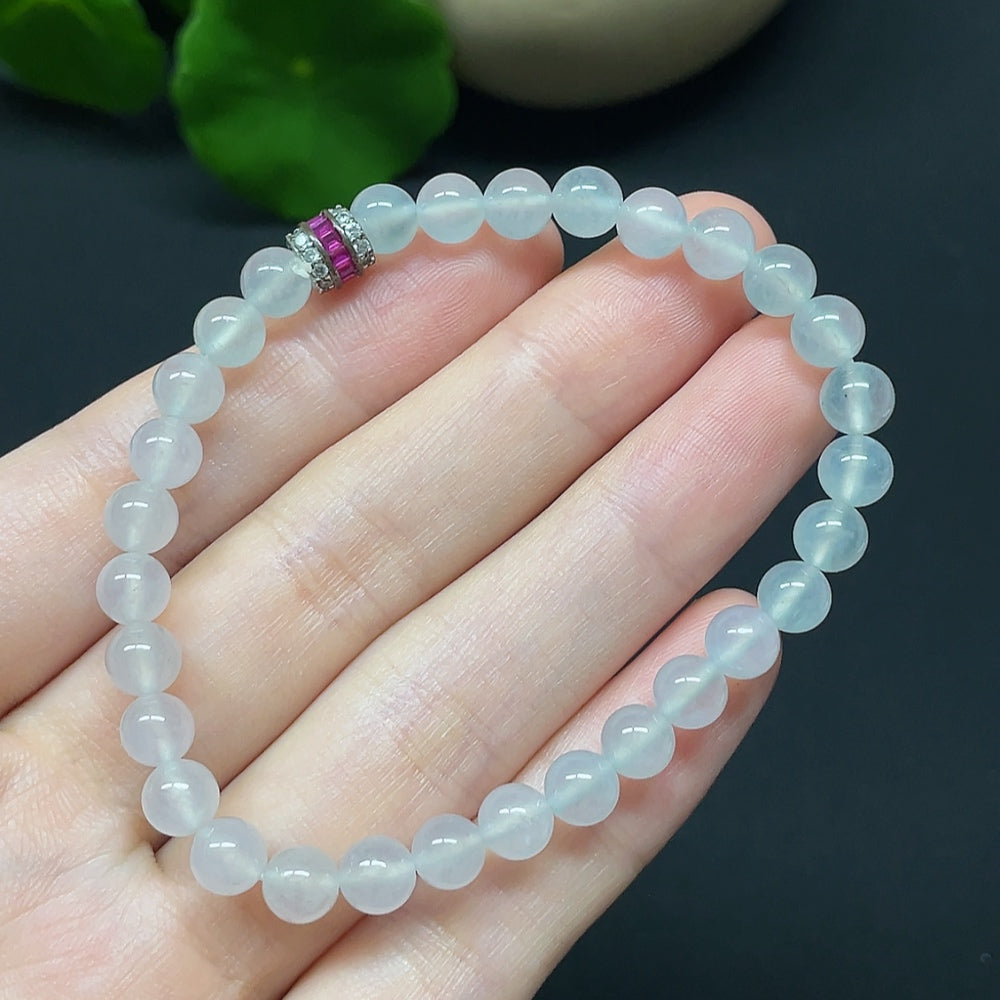 HKHQ jadeite bracelet with non-gold beads, total weight 10.66g, bead size 5.8mm, showcasing smooth green jade beads.