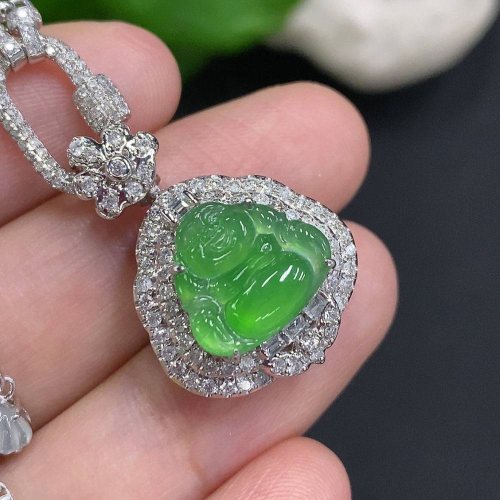 Jadeite Buddha pendant with 18K gold mount, diamond accents, attached to chain, weighing approximately 12.3g, by HUILIU HQ.
