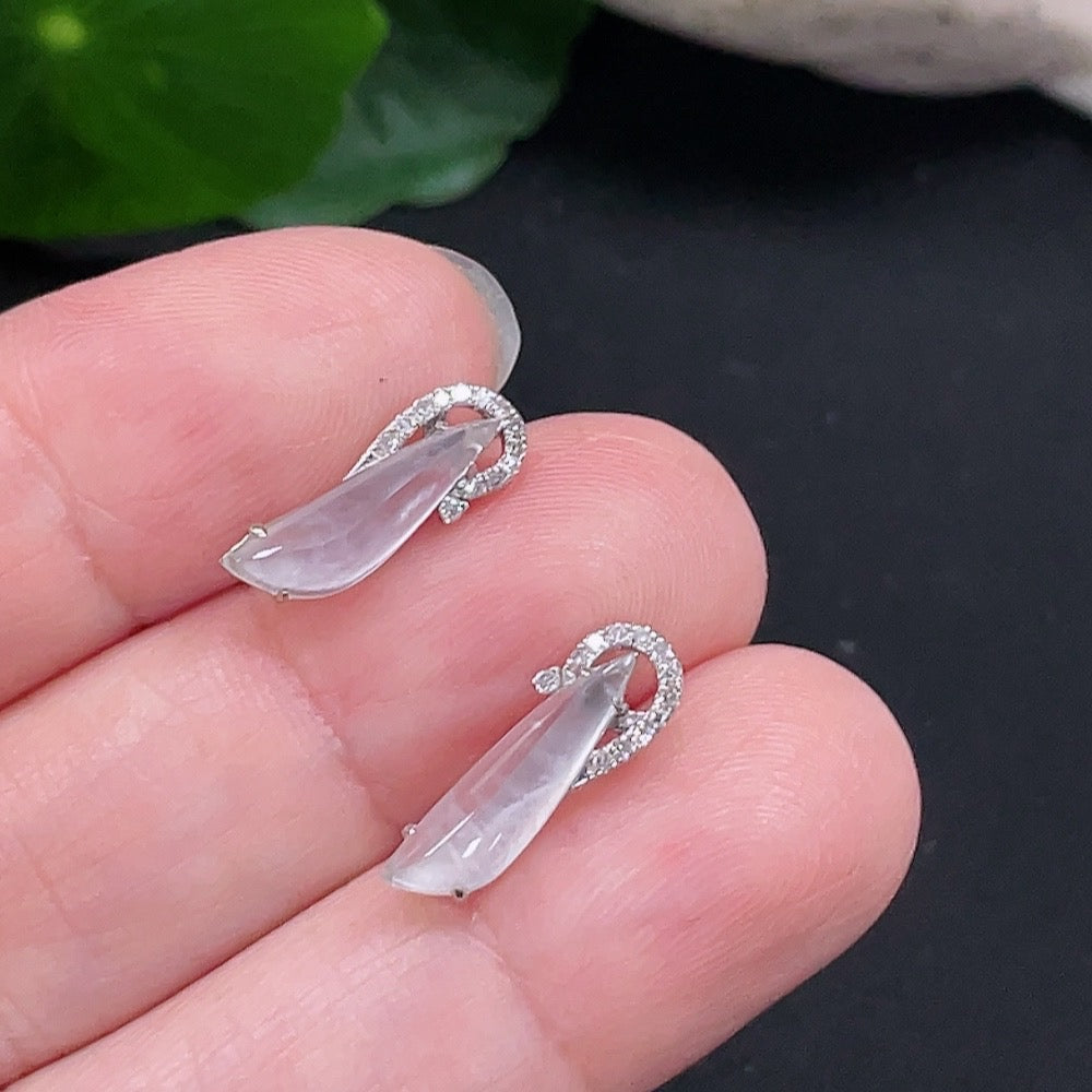HUILIU HQ jadeite earrings set in 18K gold with diamond accents, showcasing elegant green jade jewelry with sparkling details.