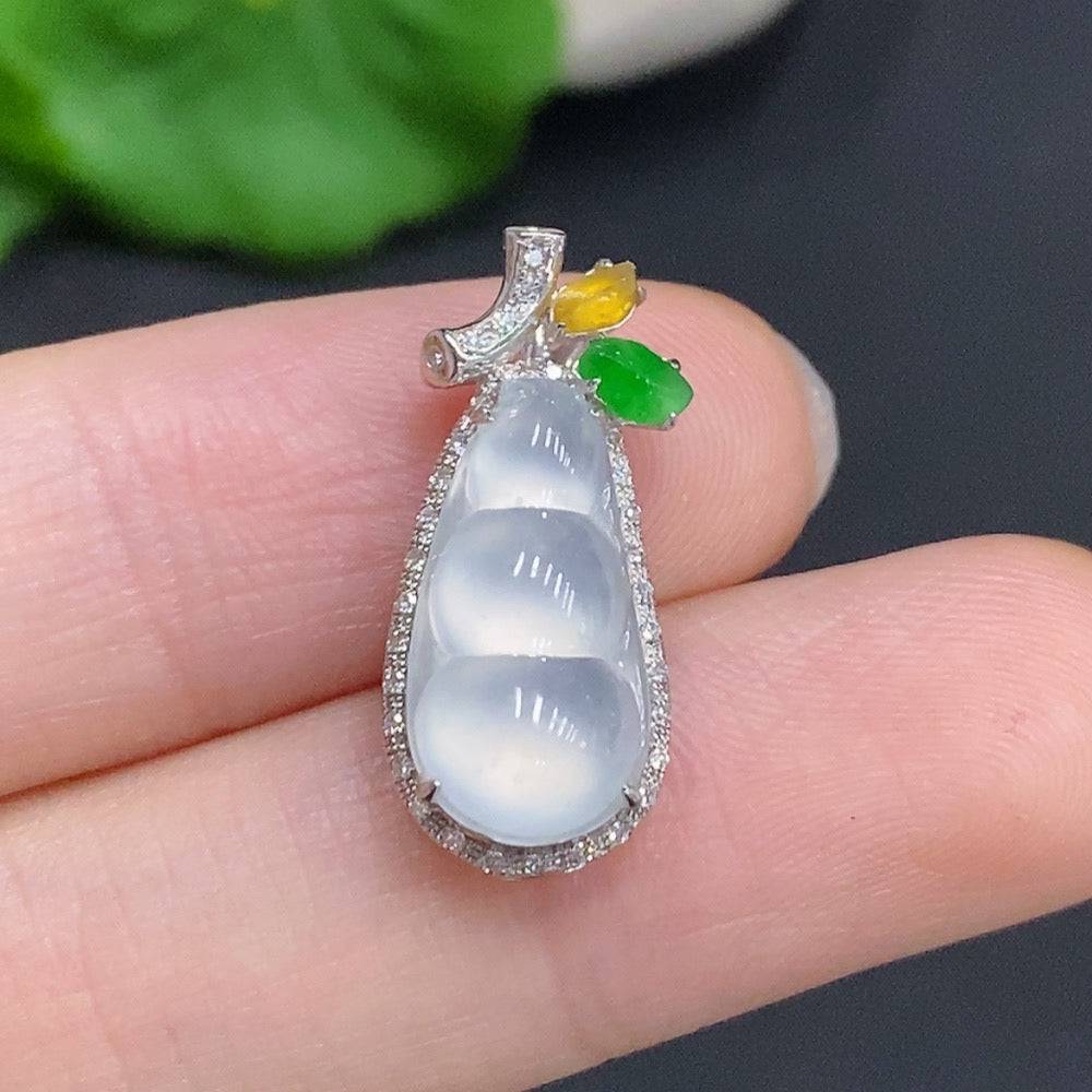 Jadeite gourd pendant with 18K gold accents and diamond details, showcasing smooth green jade and intricate craftsmanship.