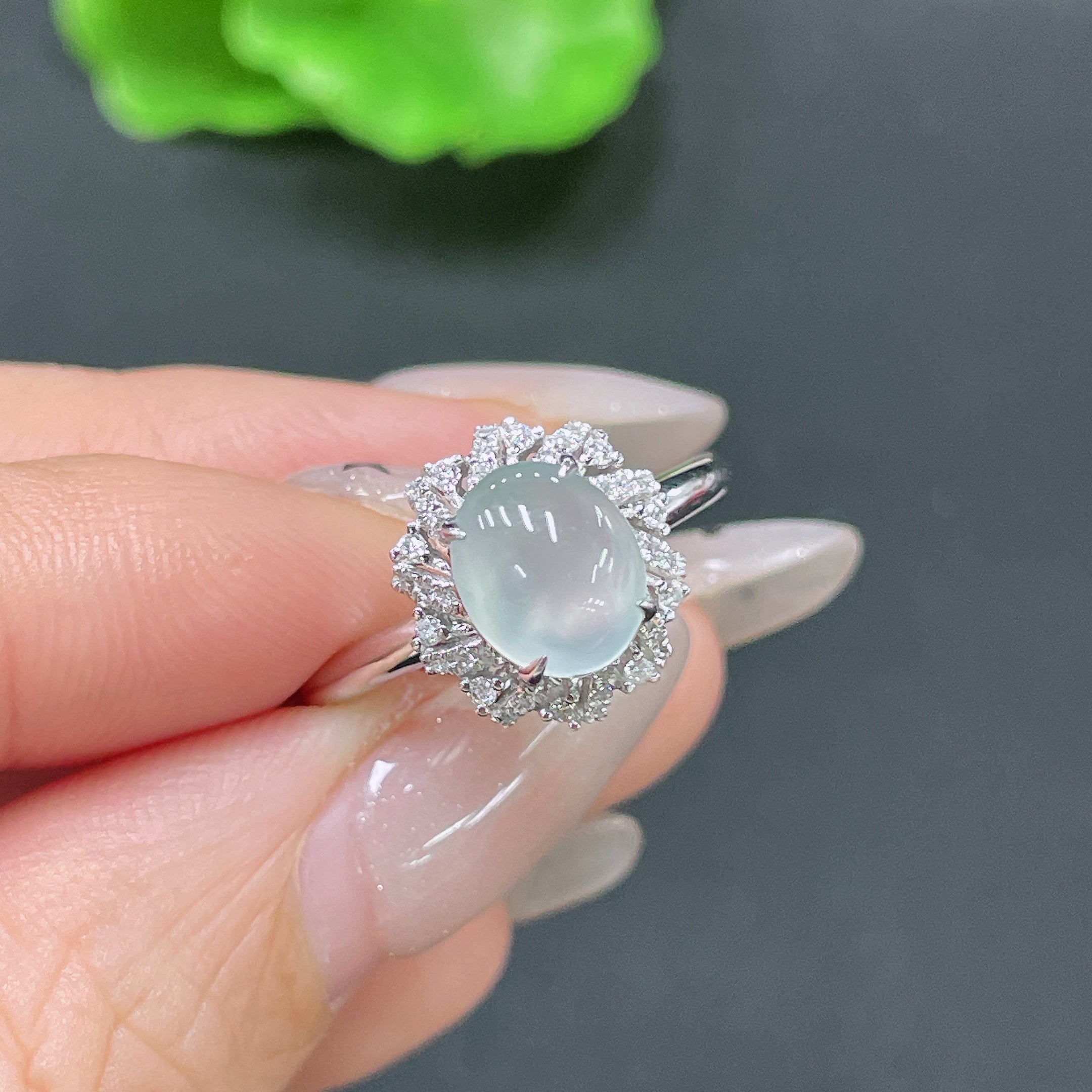 Jadeite ring with 18k gold setting and diamond accents, size 18, designed by HUILIU HQ, showcasing the elegant jewelry piece.