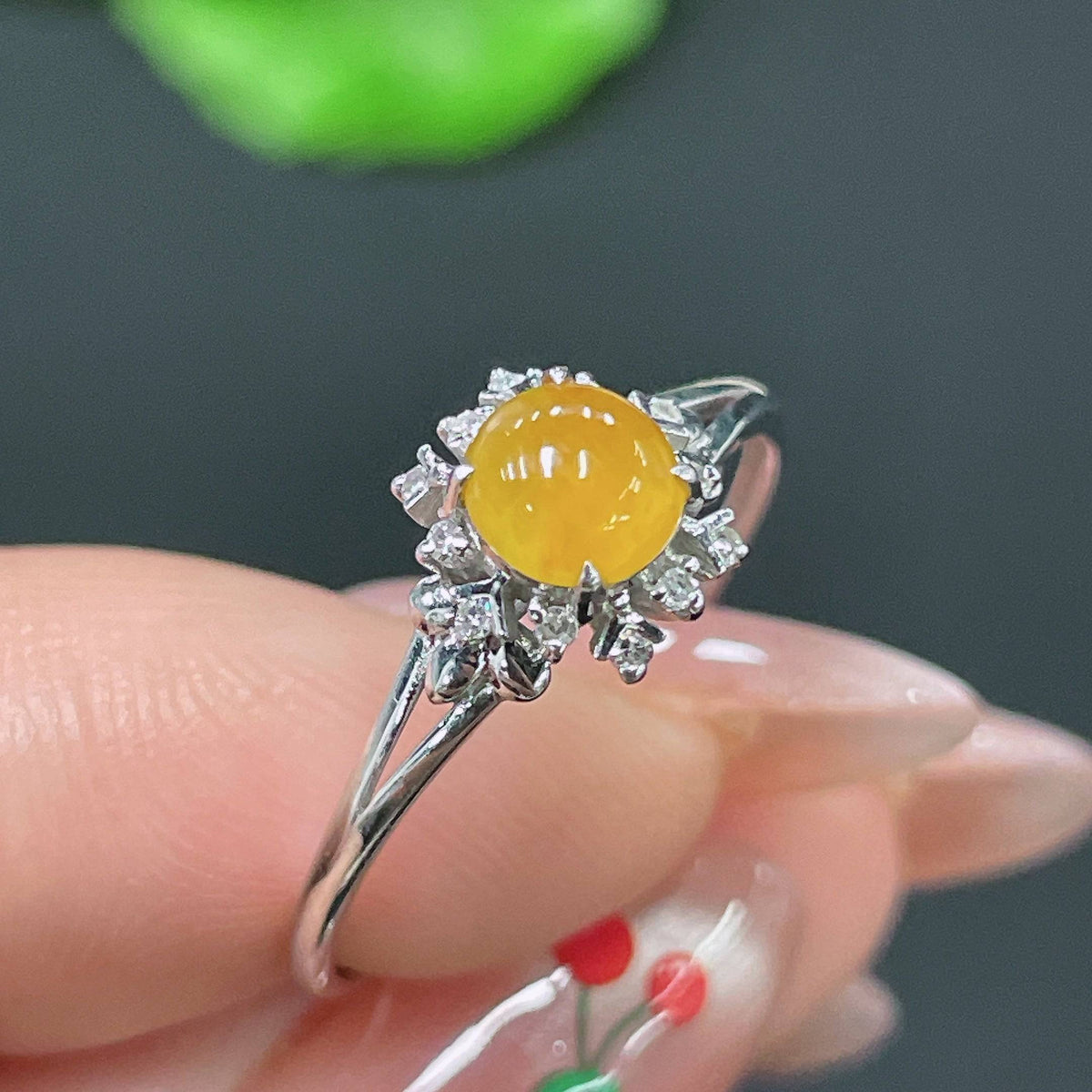 Huiliu Jadeite ring set with diamonds, featuring two elegant jade rings with sparkling diamond accents, certified by Huiliu HQ.