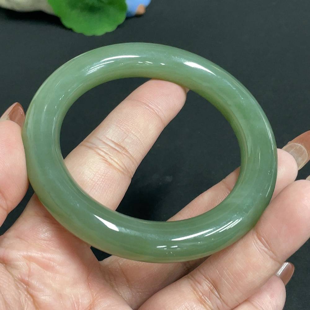 HUILIU HQ Hetian Jade round bangle, size 56.7, with a total weight of 63.7g, showcasing smooth, polished green jade surface.