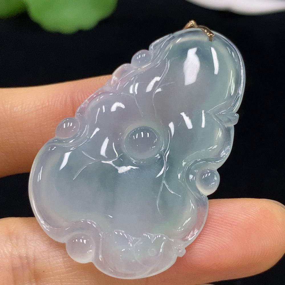 Jadeite lotus pendant from HUILIU HQ with 18k gold setting, weighing approximately 11.66g, featuring a detailed lotus flower design.