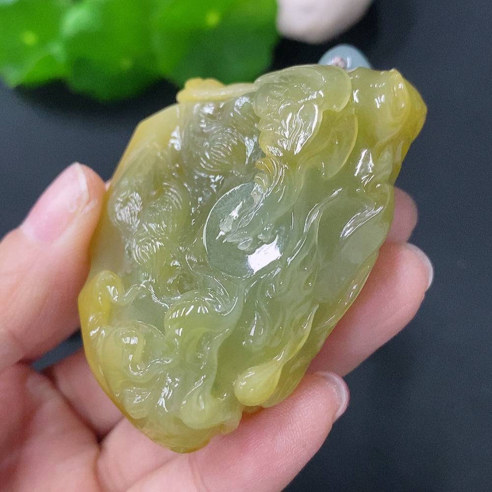 HUILIU HQ jadeite pendant featuring a phoenix design, weighs approximately 81g including rope, with undetermined color origin.