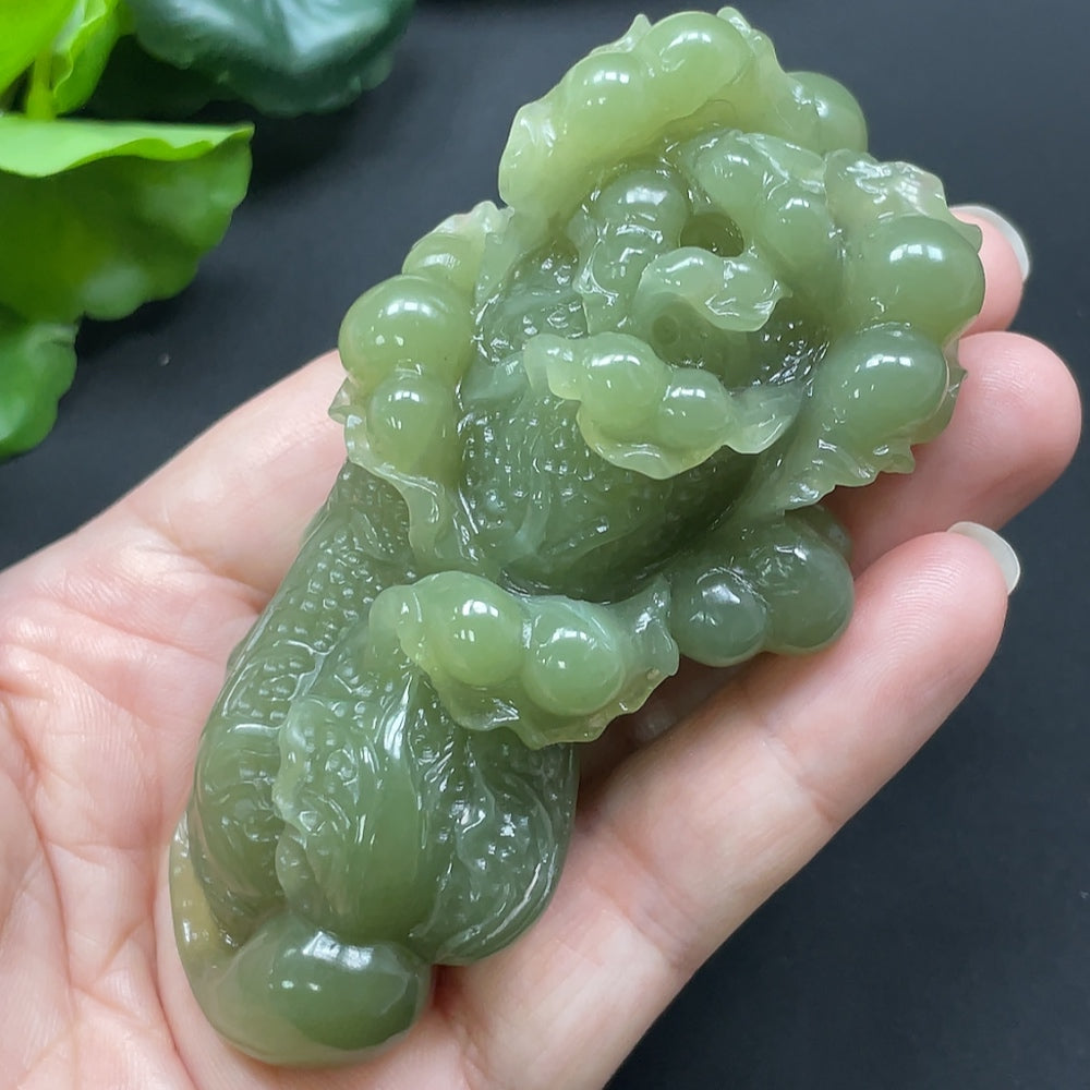 Pink Hetian jade cabbage pendant necklace with detailed carving, crafted by HKHQ, showcasing traditional Chinese jewelry design.
