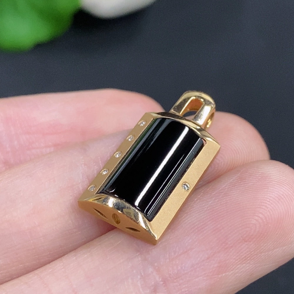 Jadeite inlaid pendant with 18K gold and diamond accents, elegant necklace showcasing intricate craftsmanship and luxurious details.