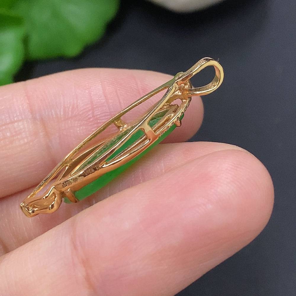 Jadeite pendant with diamond accents set in 18K gold mount, from HUILIU HQ, showing the detailed jade gemstone and gold craftsmanship.