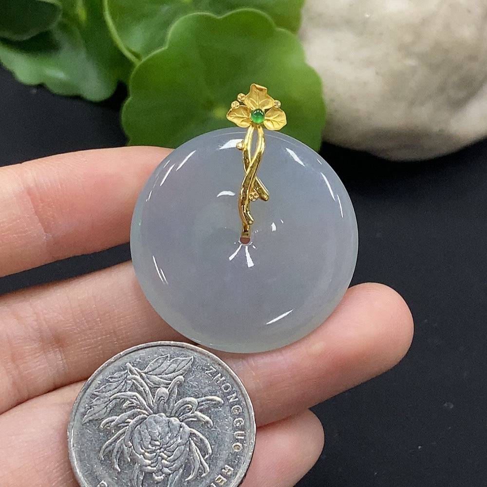 Huiliu Jadeite Peace Knot pendant with diamond accents, showcasing intricate craftsmanship and polished jade surface.