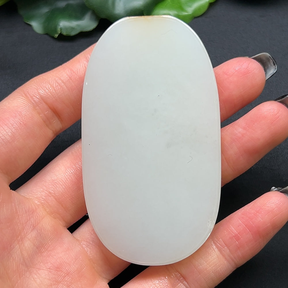 Hetian Jade Chinese Dream Ornament by HKHQ, showcasing polished jade with intricate carvings and elegant craftsmanship.