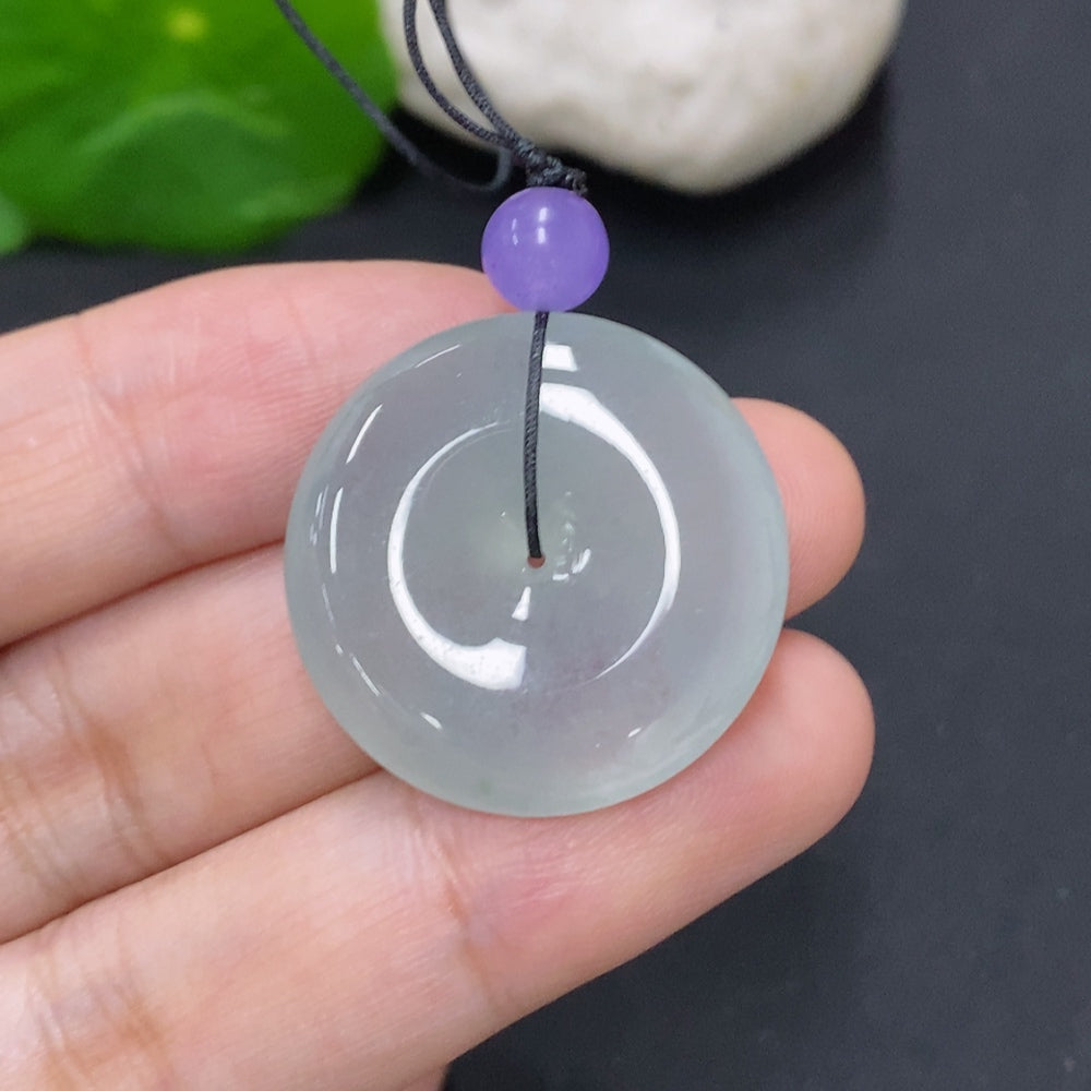 Jadeite Peace Knot jewelry piece from HKHQ, approximately 7.6 grams, featuring intricate bead design in natural jade color