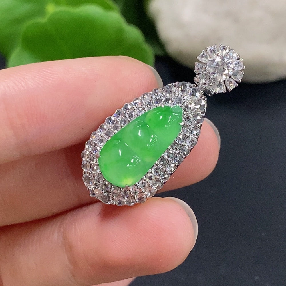 Jadeite lucky bean pendant necklace by HKHQ featuring 18K gold accents and diamond details, displayed against a neutral background.