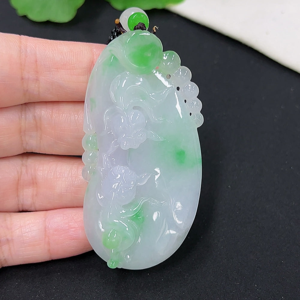 Jadeite goldfish pendant with gold accents, weighing approximately 30.5g, featuring detailed craftsmanship and a rope attachment.