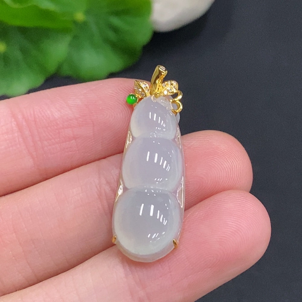 Huiliu Jadeite Lucky Bean Pendant with diamond accents, crafted from high-quality jade, featuring intricate design and vibrant green color.