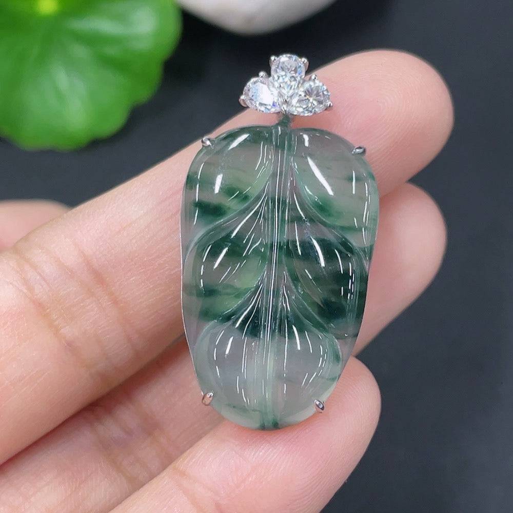 Jadeite leaf pendant by HUILIU HQ with 18k non-diamond inlay, featuring a natural green jade leaf design on a jewelry chain