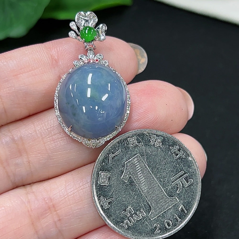 HKHQ jadeite cabochon pendant with 18k gold setting and four non-diamond accents, weight approx. 5.45g.