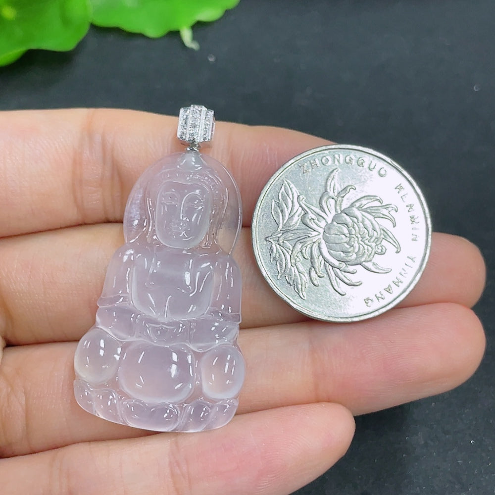Jadeite Guanyin pendant with 18K gold and diamond accents, showcasing detailed carving and elegant design.