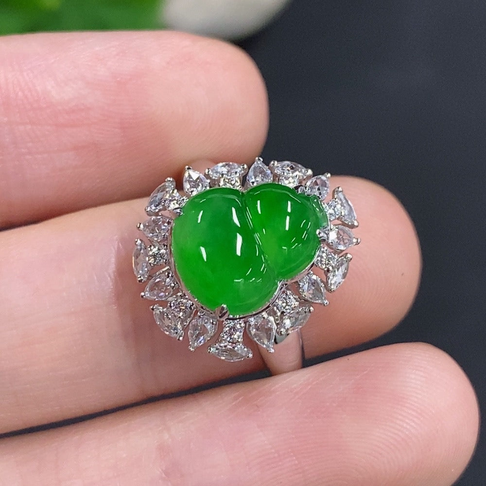 HKHQ Jadeite gourd inlay ring with 18K gold band and diamond accents, featuring intricate design and luxurious craftsmanship.