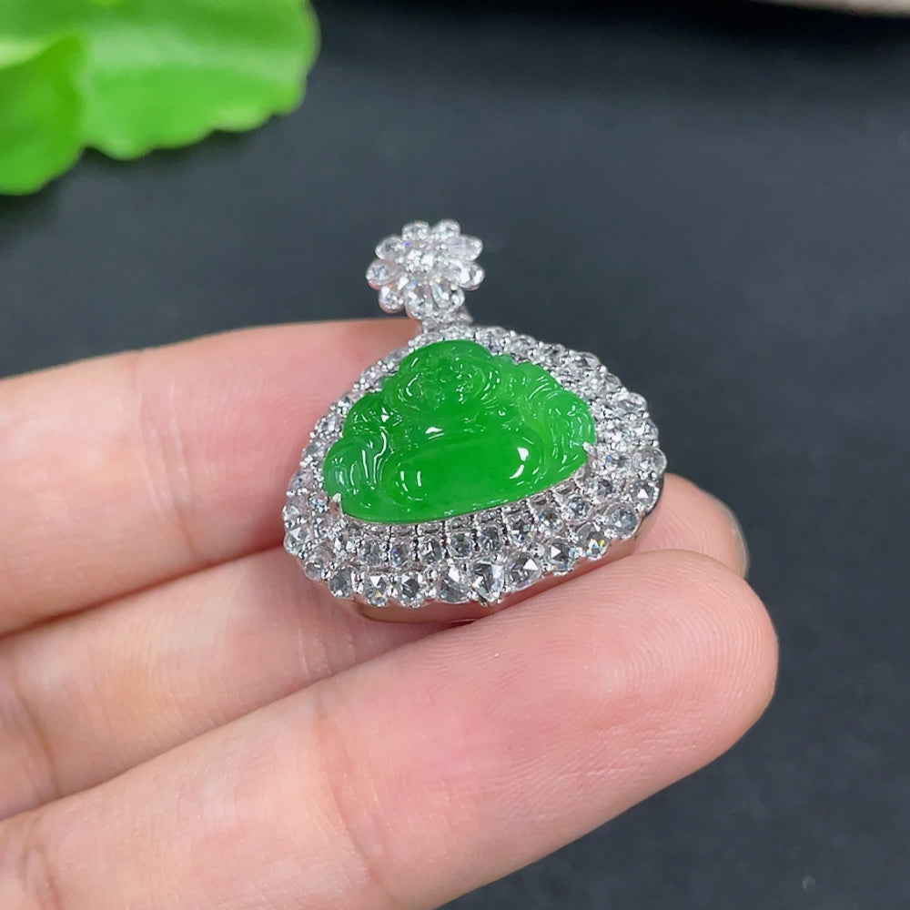Jadeite pendant with 18k gold and diamond accents, weighing approximately 7.3g, showcasing a polished green jade stone.