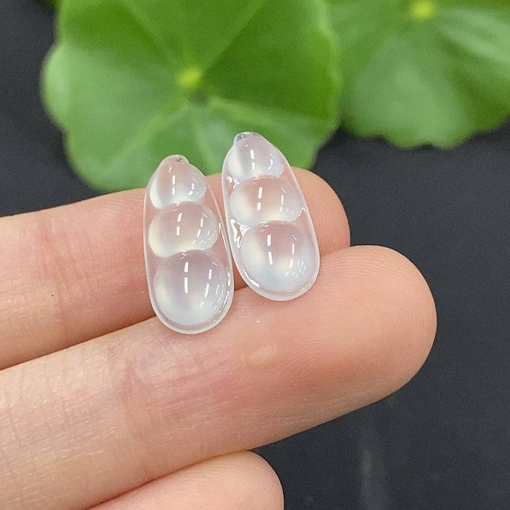 Jadeite auspicious bean inlay piece by HUILIU HQ showcasing intricate jade craftsmanship, natural green jade color and detailed design.