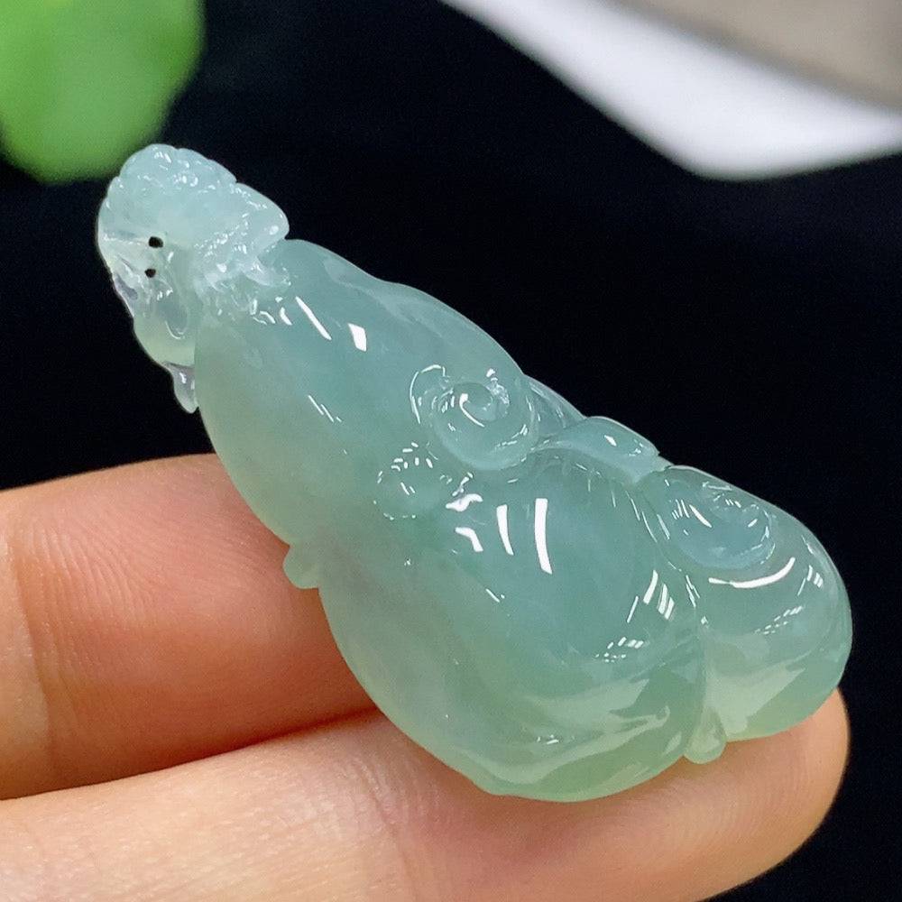 Huiliu Jadeite Ruyi pendant featuring intricate carved design, certified jade jewelry, displayed against a neutral background.