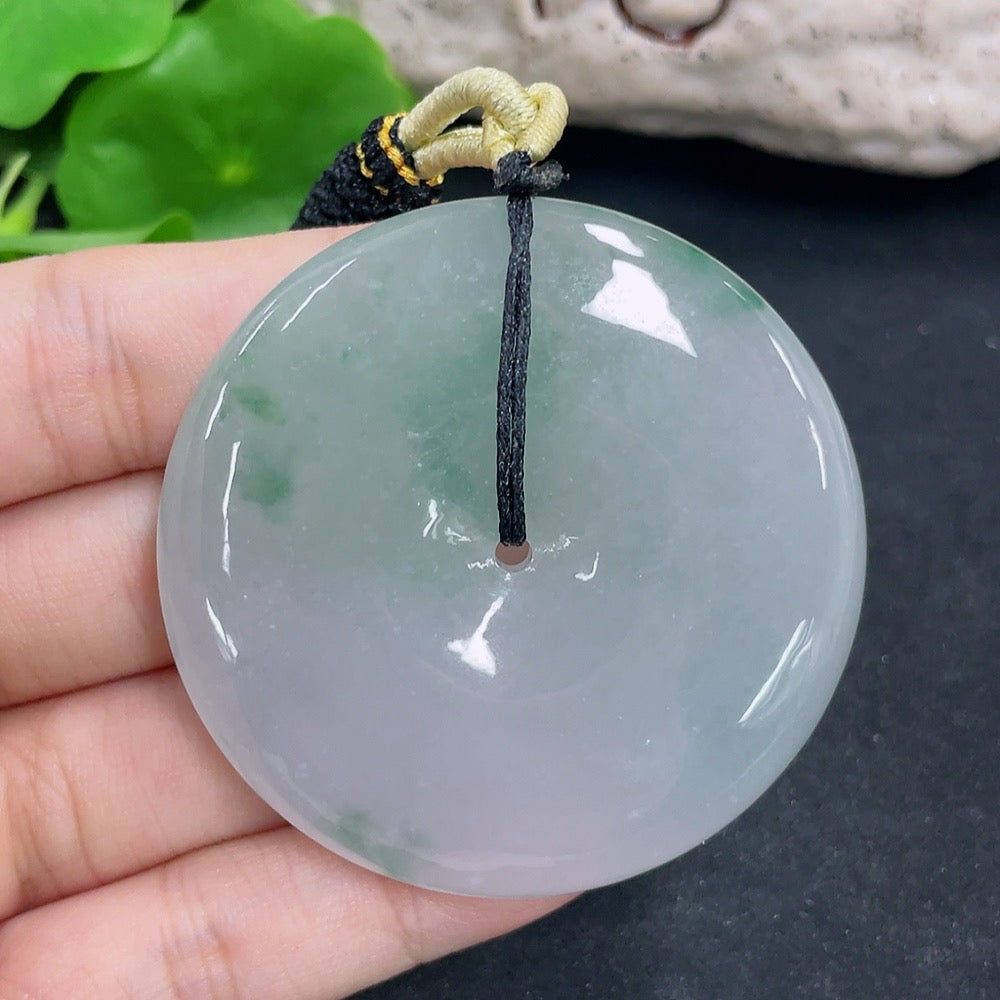 Jadeite Peace Knot pendant necklace with intricate knot design, crafted by HKHQ, weighing approximately 60.16 grams.