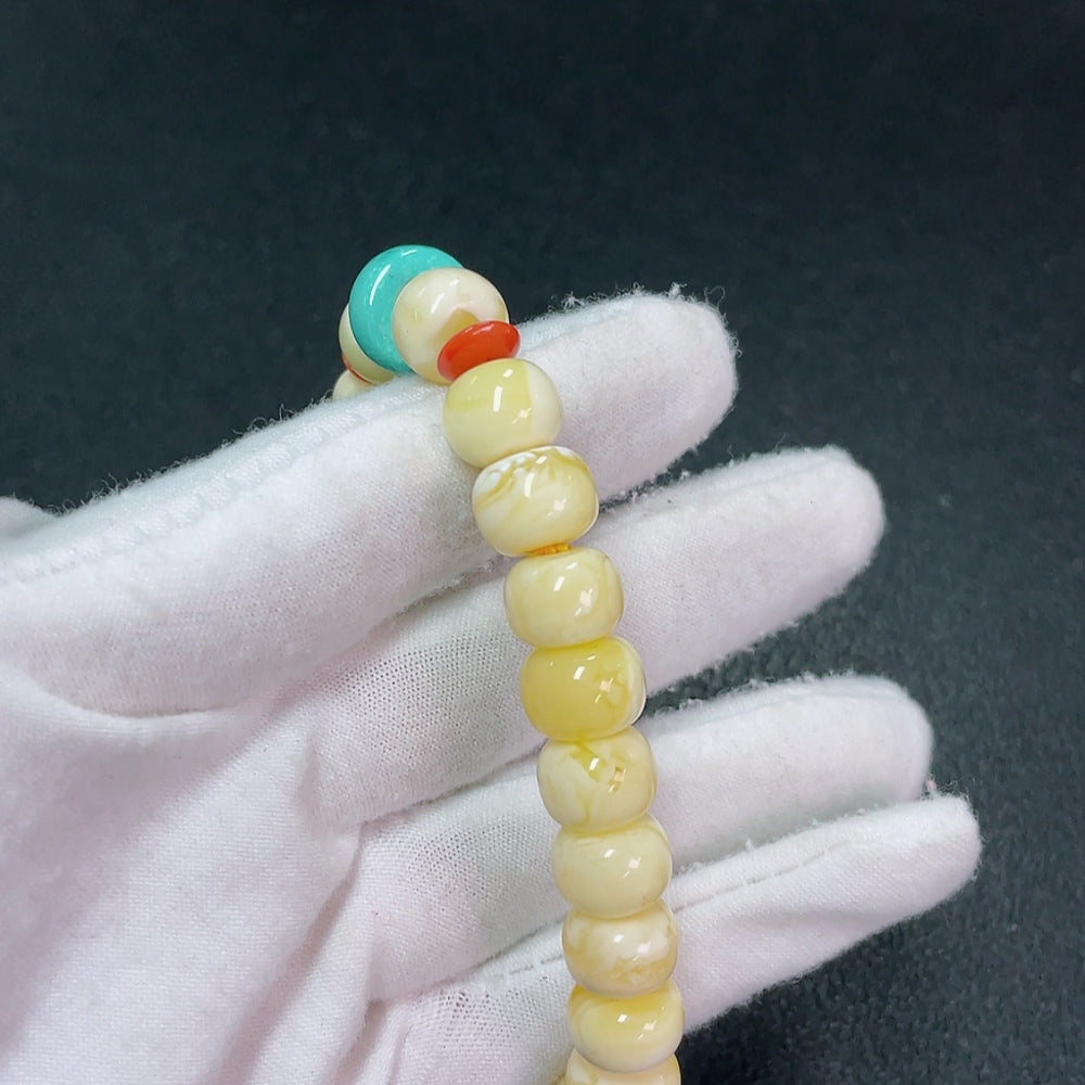 Amber Beeswax Bracelet with Hetian Jade (stone setting may be non-natural), total weight approx. 16.52g, size about 10mm