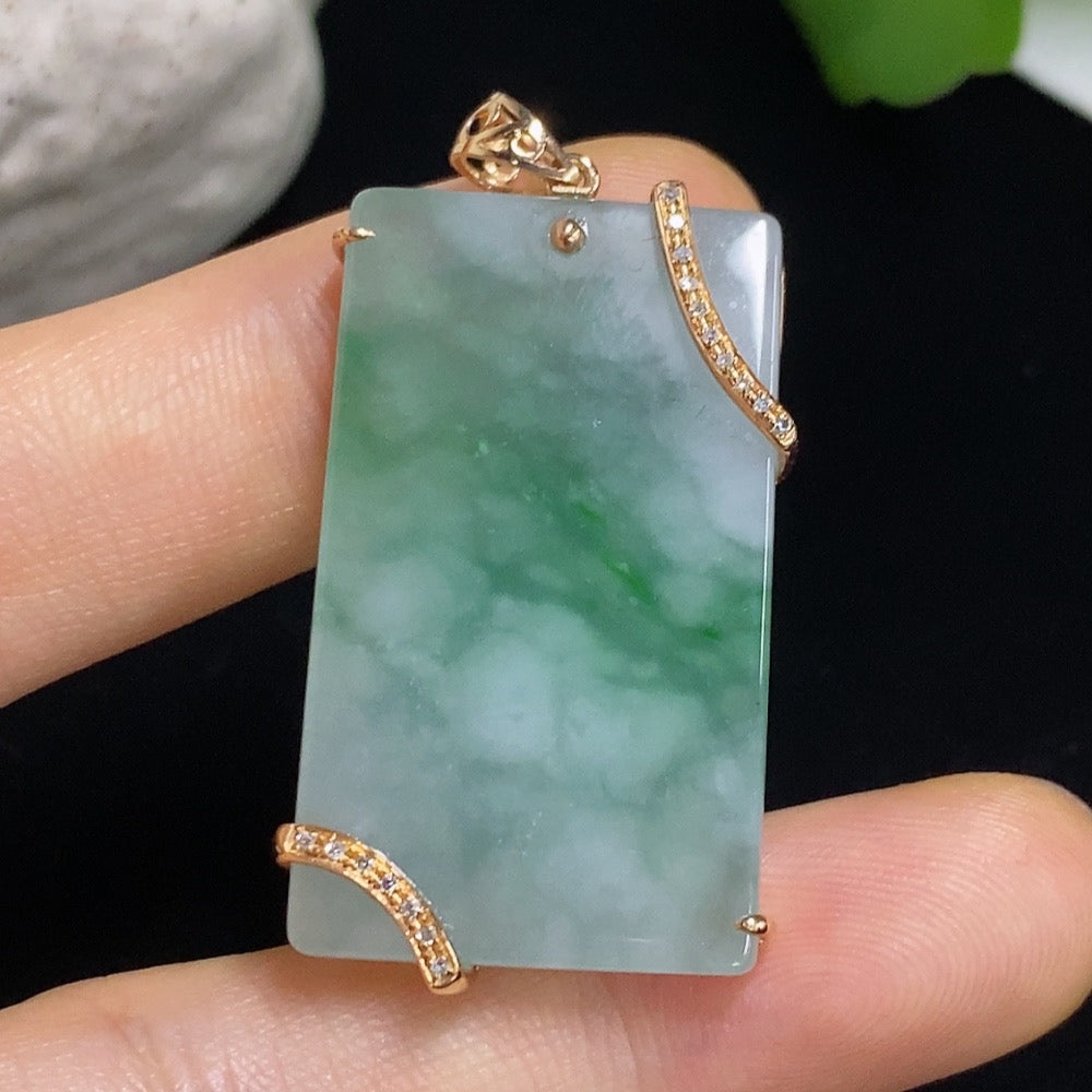 Jadeite pendant with 18K gold mount and diamond accents, featuring a smooth plain jade surface, weight approx. 9.87g.