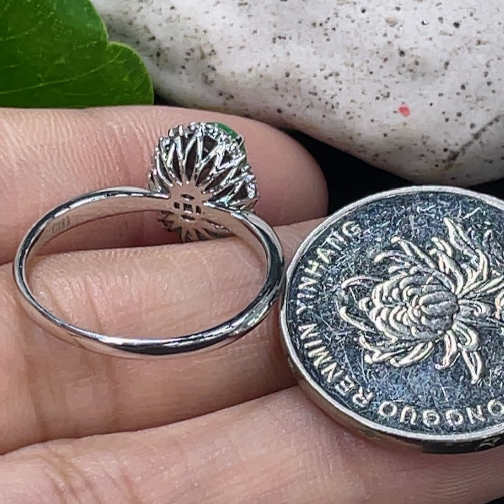 Huiliu Jadeite ring with inlaid diamonds, featuring intricate jade design and sparkling diamond accents in a close-up shot.
