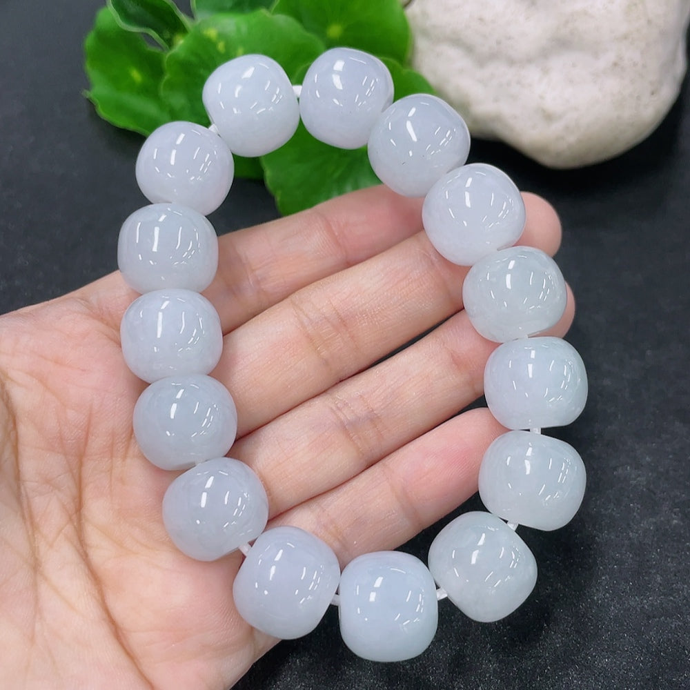 Jadeite bracelet with 14.3mm beads, crafted by HKHQ, showcasing smooth, polished jade stones on a neutral background.