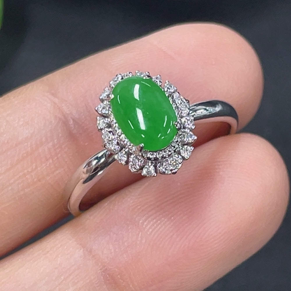 Huiliu jadeite ring with inlaid diamond accents, featuring intricate craftsmanship and a polished finish.