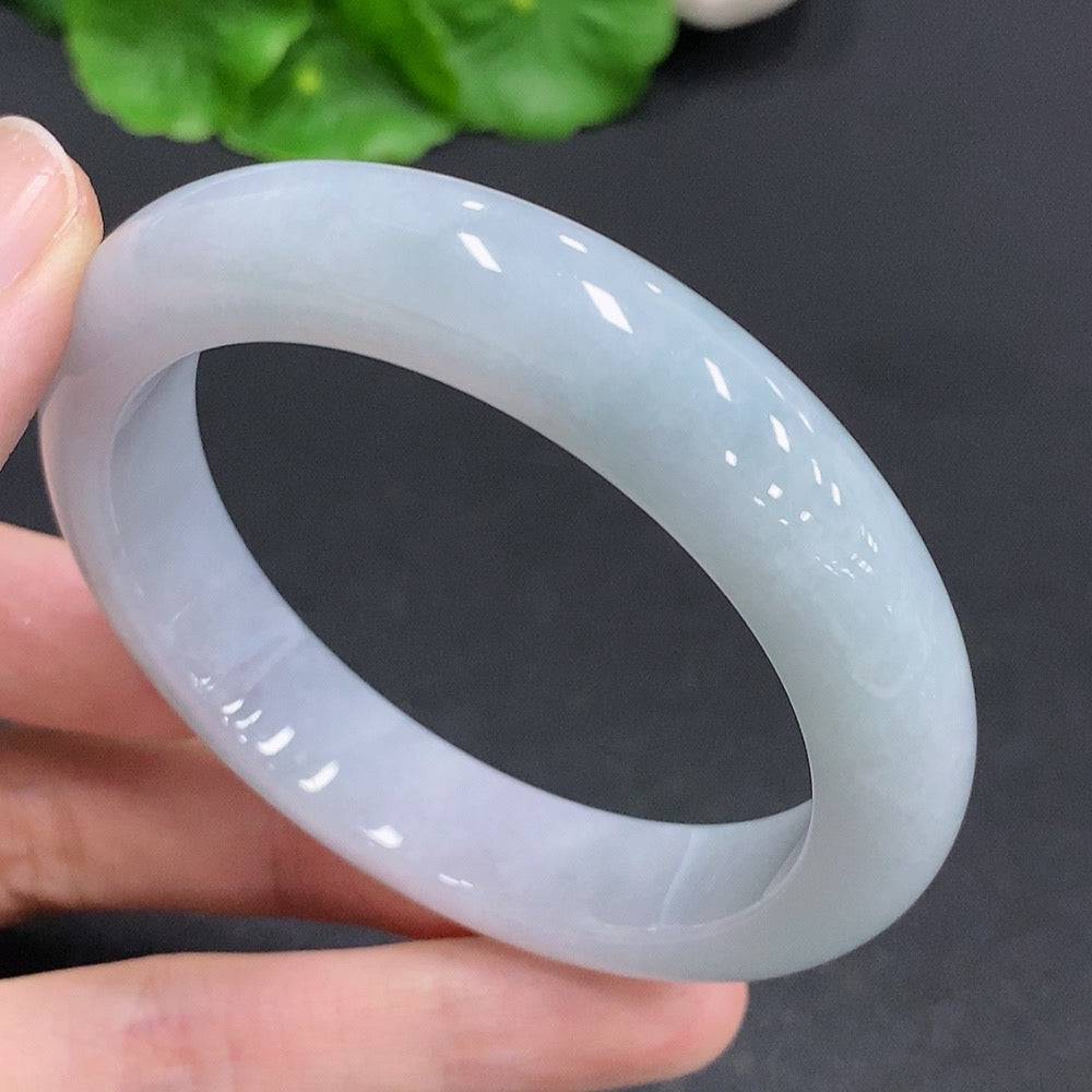 Huiliu certified jadeite round bracelet with smooth polished jade beads, showcasing natural green hues and elegant design.