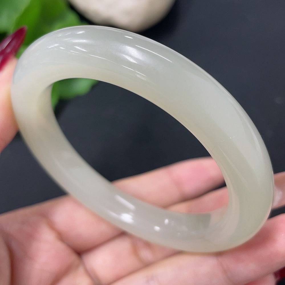 Hetian jade round bracelet by HUILIU HQ, size 55, weighing approximately 52.3g, featuring smooth, polished jade beads.