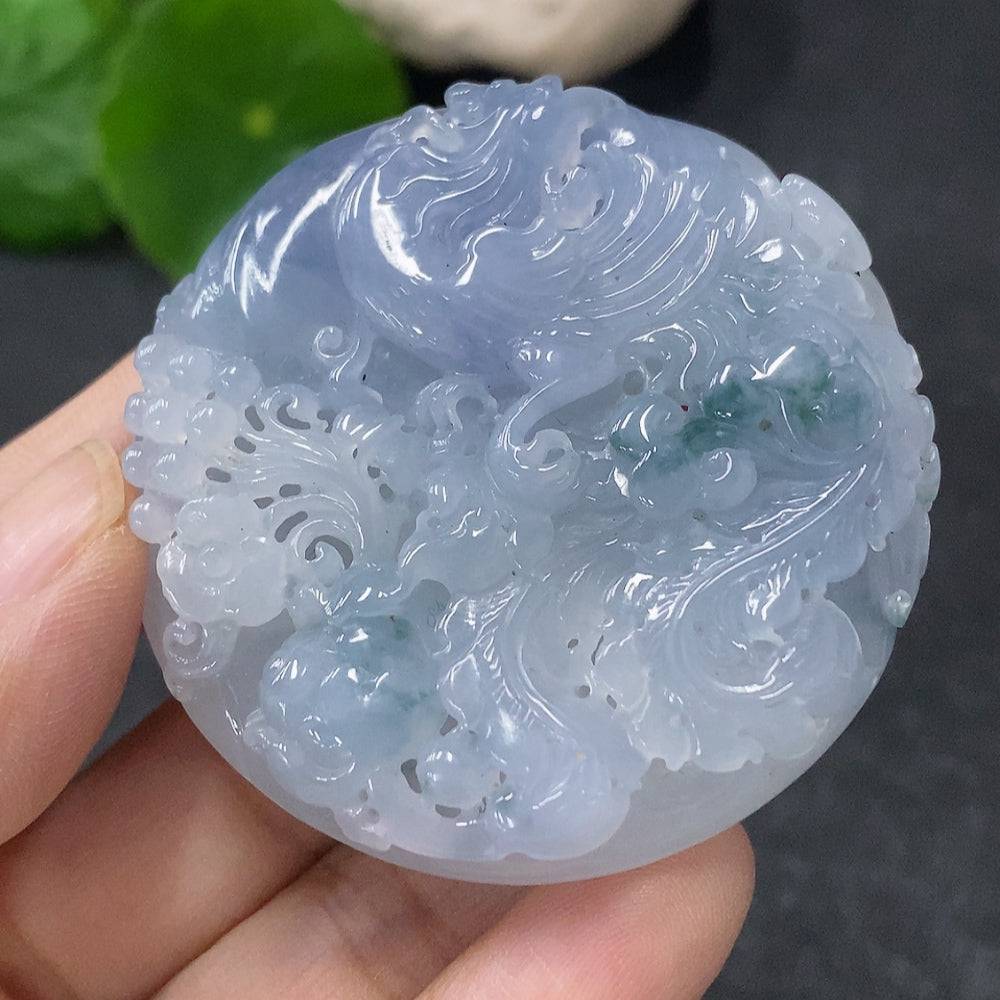Jadeite phoenix pendant from HUILIU HQ, detailed green jade carving with intricate phoenix design, weighs approximately 49.9g.