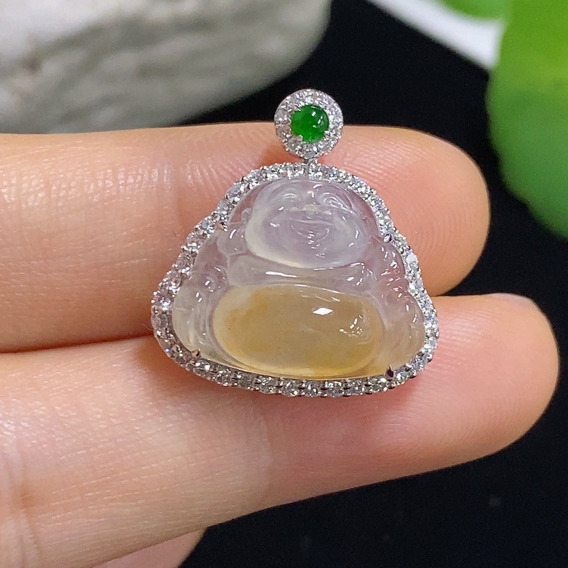 Jadeite Buddha pendant necklace with 18K gold and diamond accents, featuring a detailed Buddha figure, weighing 4.16g.