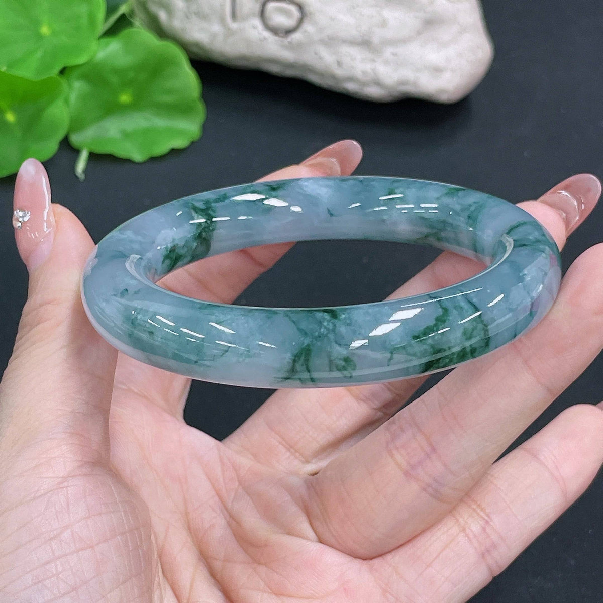 HUILIU HQ jadeite round bangle, 74.57g, size 56.3, smooth green jade jewelry bracelet on a plain background