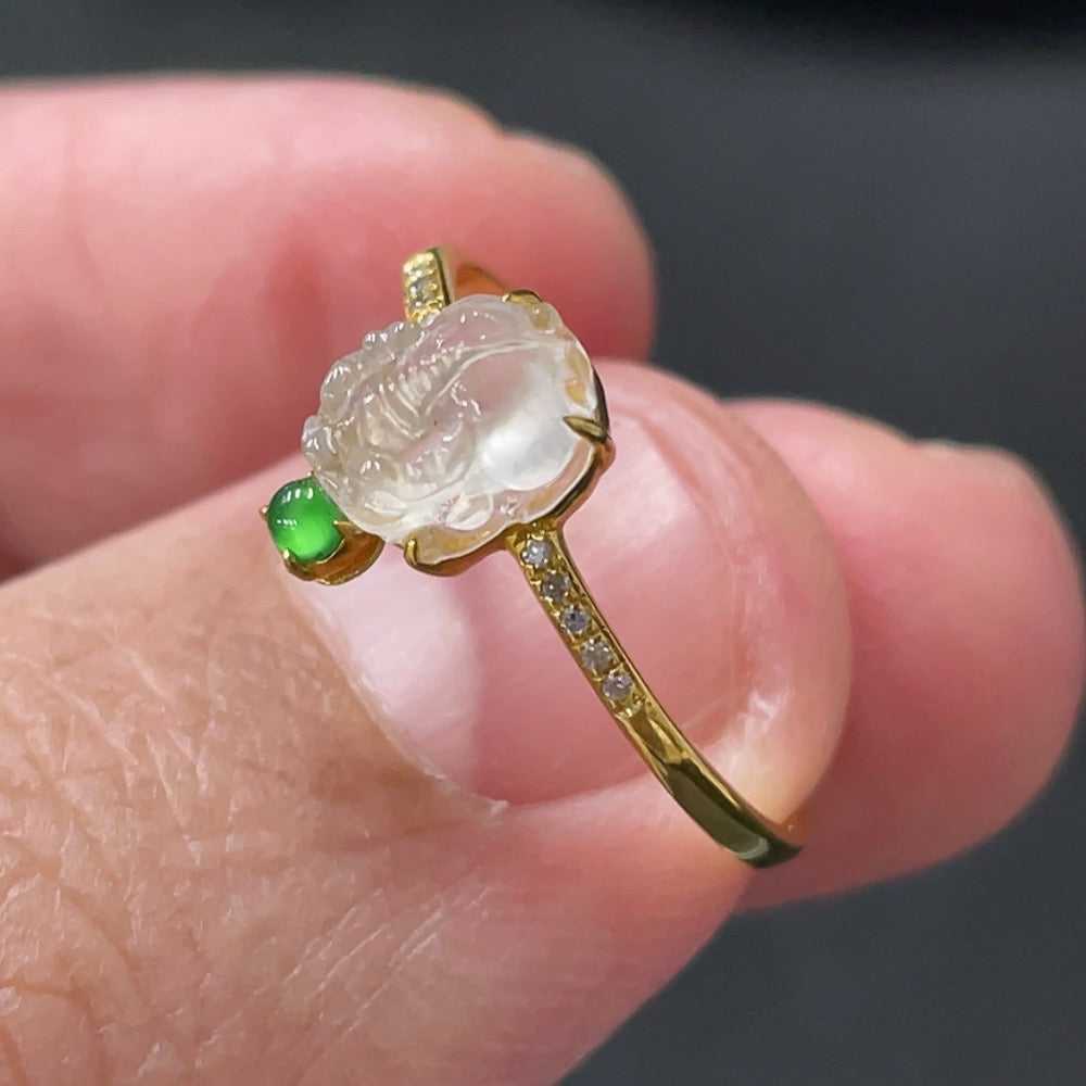 Jadeite cabochon solitaire ring with 18K gold setting, accented with diamonds, size 13, from HUILIU HQ.
